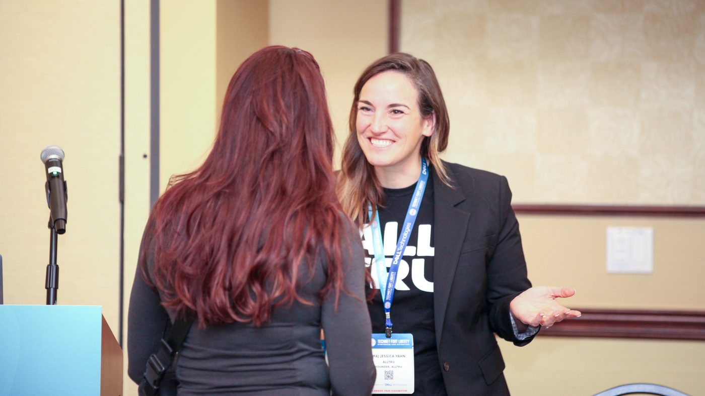 Two attendees in conversation at a chapter networking event
